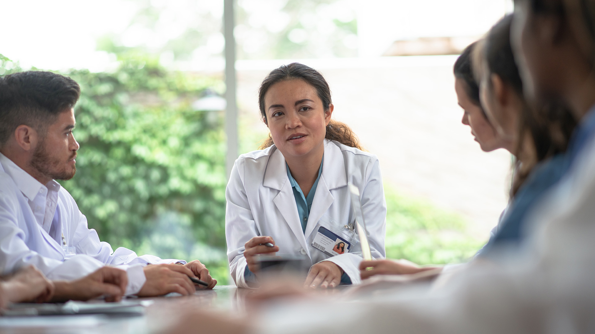 Female hiring manager assessing soft skills for the role of principal investigator in clinical research.