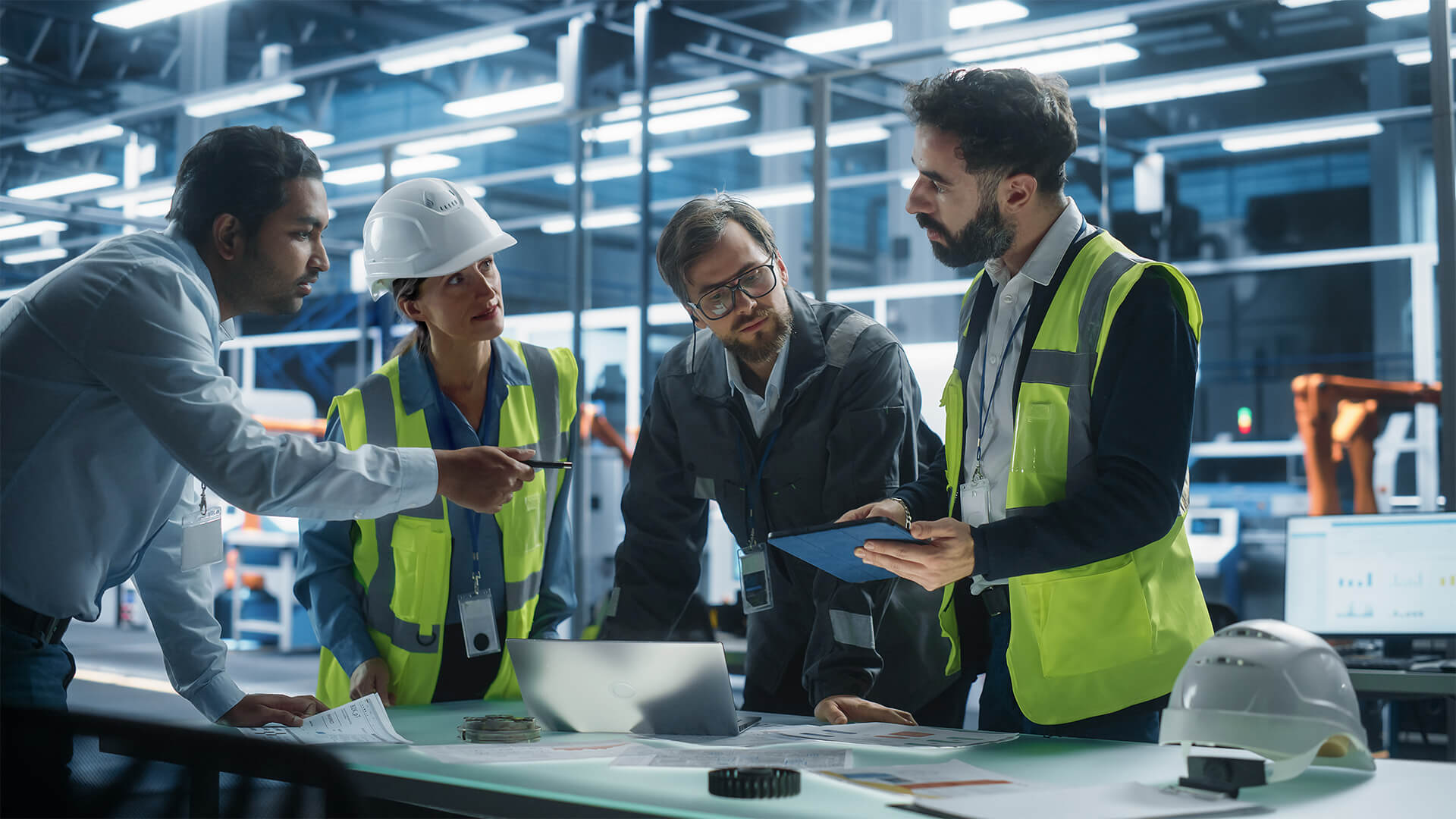 Manufacturing engineering experts ensuring quality standards are met when designing manufacturing systems.