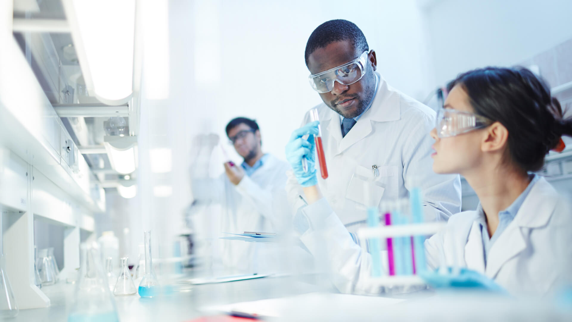 Team of lab technician in the food and beverage industry perform tests to disrupt product launches.