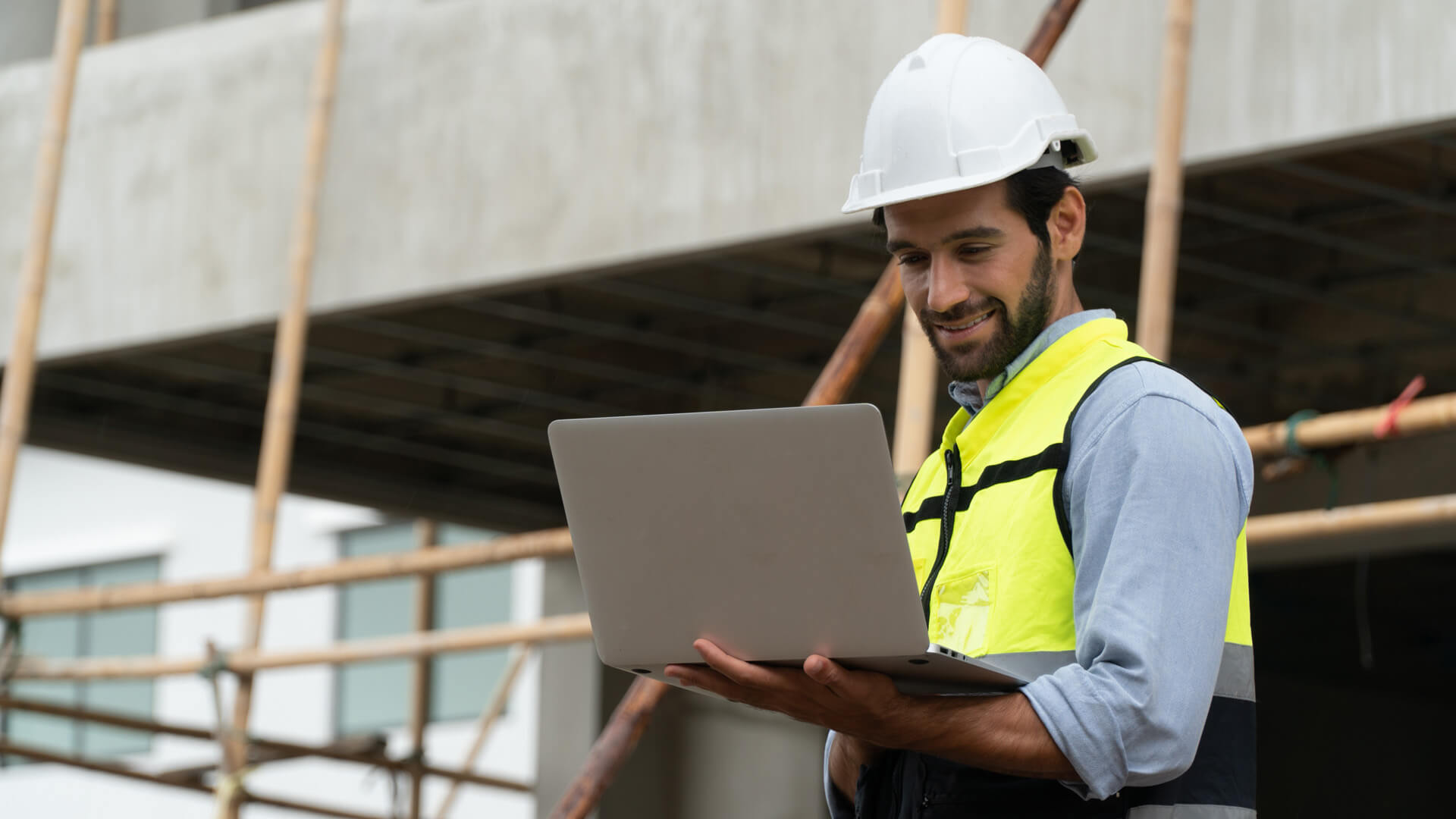 Project manager onsite reviewing AI and digital transformation in data center construction projects. 