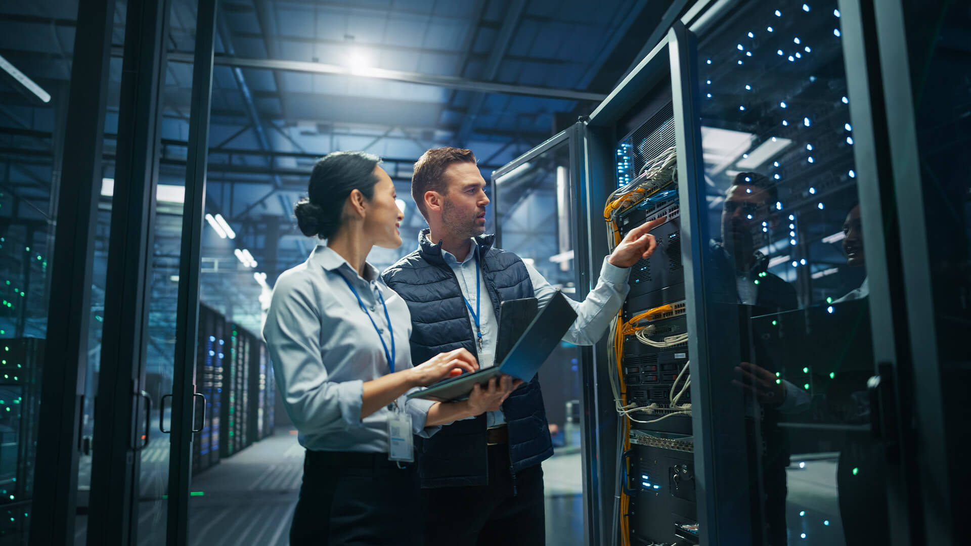 Engineering professionals discussing how specialized engineering talent can accelerate optical networking for AI/data centers.